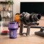Dyson V12 Detect Slim Absolute: de basiseenheid uit elkaar gehaald: reservoir, stoffilter, eenheid met motor, accu