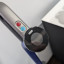 De handgreep met de bedieningsknoppen van de Dyson WashG1.