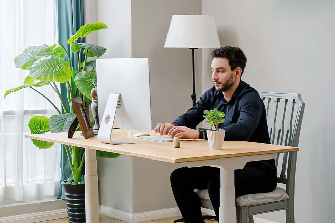 Werken in stijl doe je aan een FlexiSpot E8 zit sta bureau (sponsored)